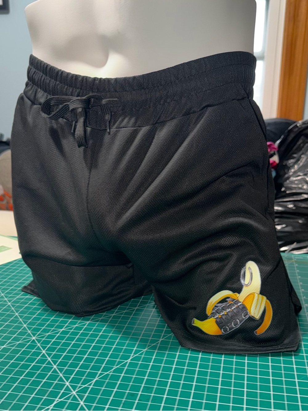 Black Men's Athletic Shorts with Banana Graphic